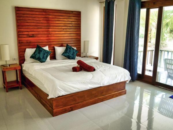 Seaside Sanctuary Bungalows : photo 3 de la chambre bungalow deluxe - vue sur jardin