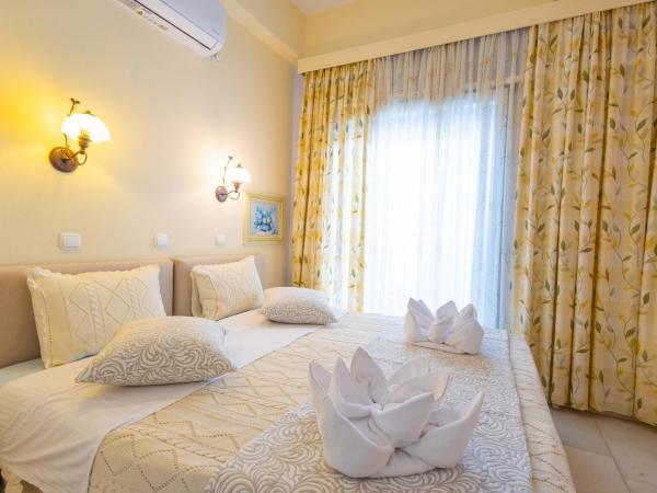 Kymata Hotel : photo 8 de la chambre chambre triple Économique