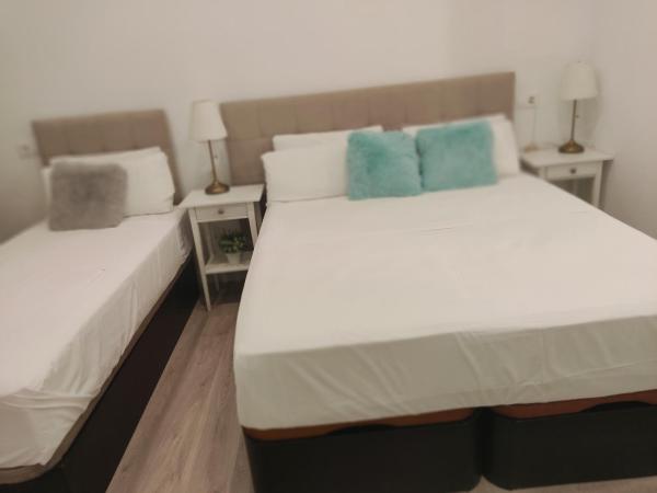 Grand Via House : photo 3 de la chambre chambre triple supérieure