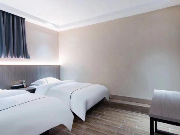 Guangzhou Haiyue Hotel : photo 2 de la chambre chambre lits jumeaux deluxe