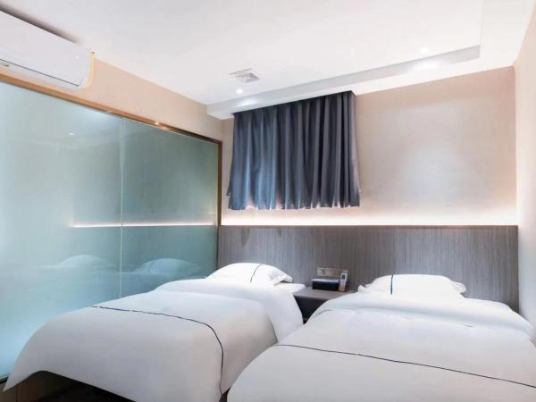 Guangzhou Haiyue Hotel : photo 3 de la chambre chambre lits jumeaux deluxe