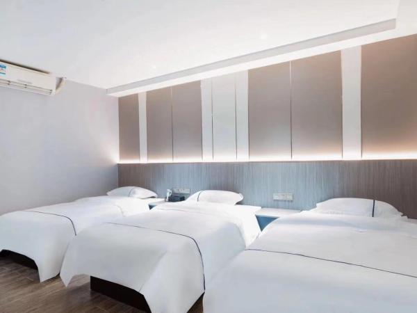 Guangzhou Haiyue Hotel : photo 1 de la chambre chambre triple de luxe