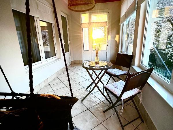 Willa Zacisze - Pokoje Gościnne : photo 6 de la chambre chambre quadruple avec balcon