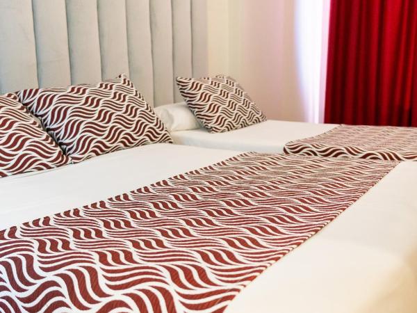 Hostal Juliette-Gran Vía : photo 6 de la chambre chambre triple basique