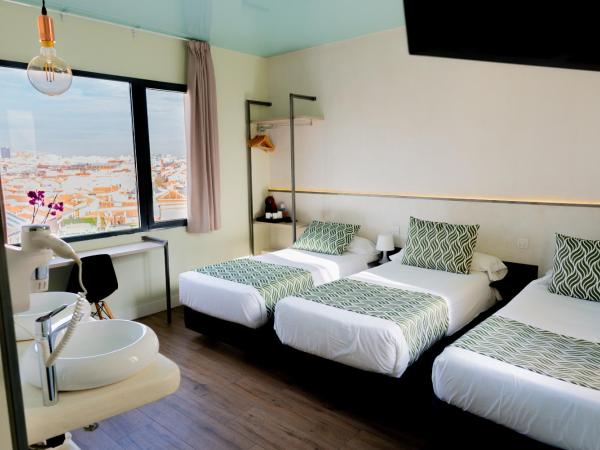 Hostal Charlotte-Gran Vía : photo 1 de la chambre chambre triple Économique