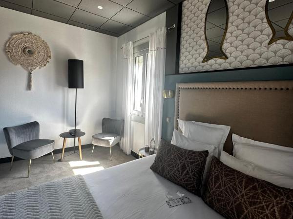 Grand Hôtel Richelieu : photo 2 de la chambre grande chambre double - vue partielle sur mer