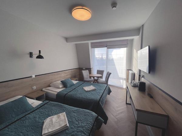 Promień Słońca : photo 1 de la chambre chambre quadruple