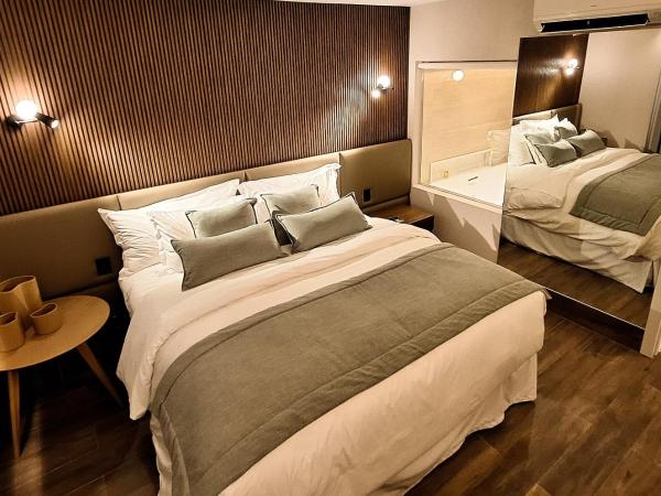 Hilton Garden Inn Belo Horizonte Lourdes : photo 4 de la chambre appartement