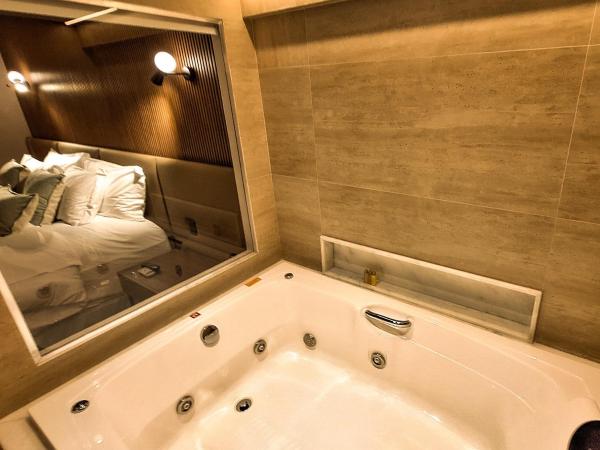 Hilton Garden Inn Belo Horizonte Lourdes : photo 1 de la chambre appartement