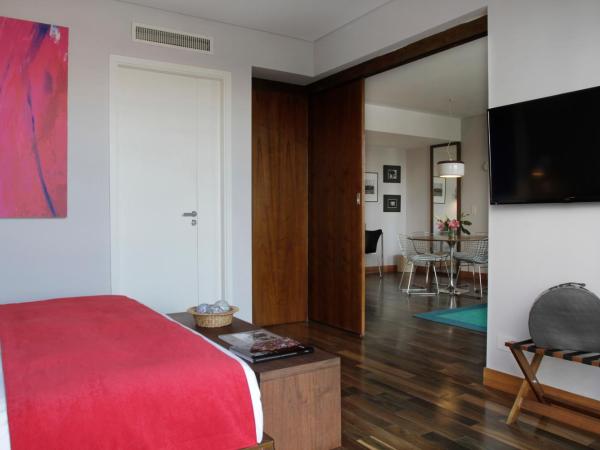 Palo Santo Hotel : photo 10 de la chambre suite de luxe avec baignoire spa