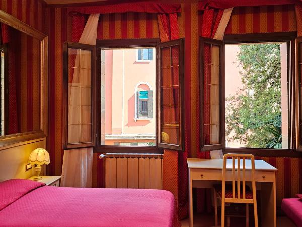 Hotel Messner : photo 1 de la chambre chambre triple supérieure – vue sur jardin