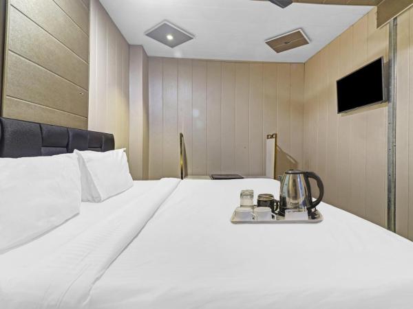 Townhouse 751 Bhavya Residency : photo 9 de la chambre chambre triple classique