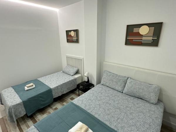 Alojamiento Fantasía : photo 4 de la chambre chambre triple deluxe