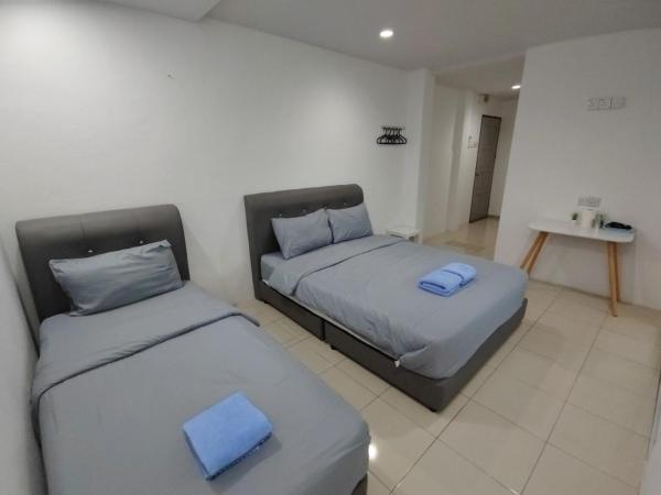 184 GURNEY DRIVE PENANG : photo 1 de la chambre chambre familiale avec salle de bains