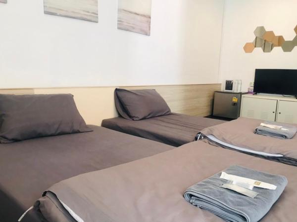 Shade House - Phuket Downtown : photo 7 de la chambre chambre lits jumeaux deluxe