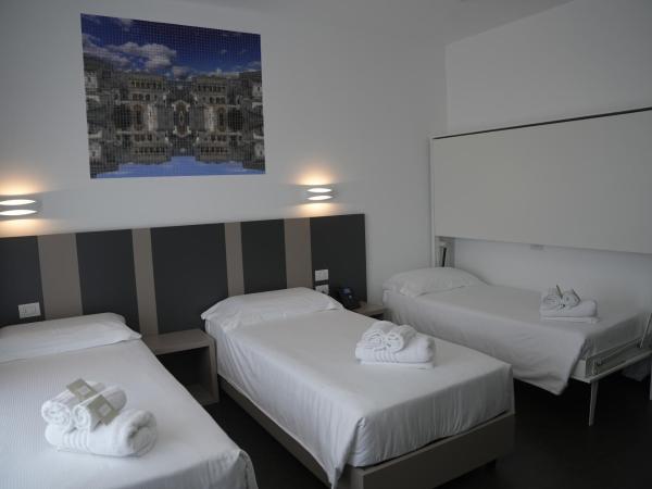 HOTEL MOSAICO : photo 3 de la chambre chambre triple