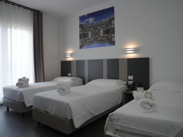 HOTEL MOSAICO : photo 6 de la chambre chambre triple