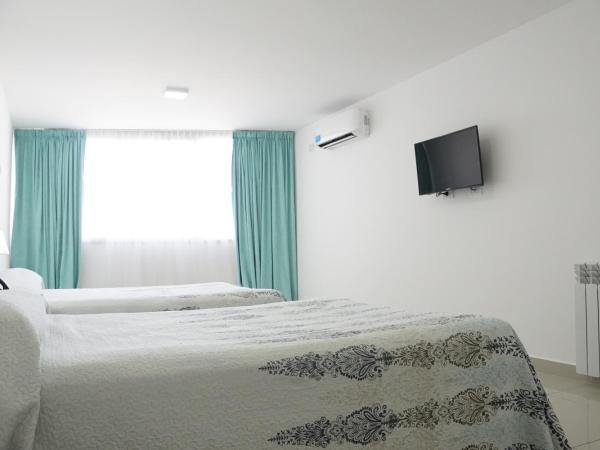 Hotel Howard Johnson Rosario : photo 3 de la chambre appartement