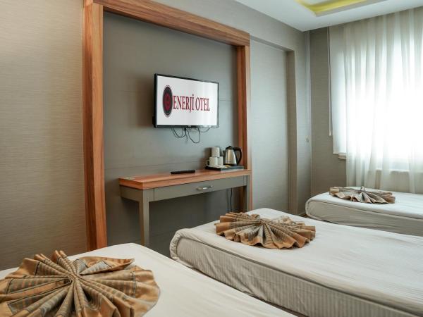 Enerji Otel : photo 5 de la chambre chambre triple basique