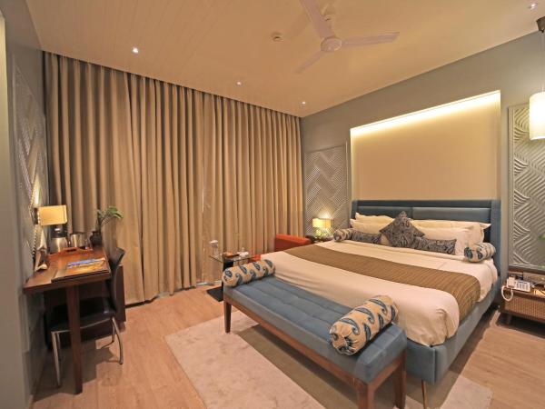 Amantra Comfort Hotel : photo 3 de la chambre chambre lit king-size supérieure