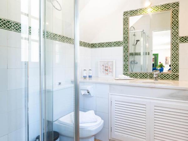 The Touch Club : photo 5 de la chambre chambre quadruple - vue sur jardin