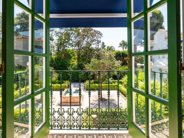 The Touch Club : photo 3 de la chambre chambre quadruple - vue sur jardin