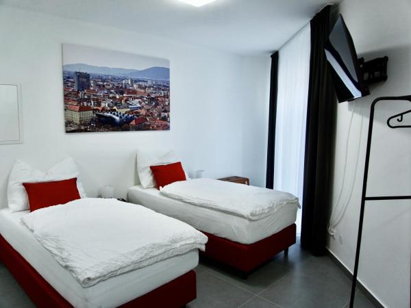 Grazora Living Apartments : photo 6 de la chambre chambre lits jumeaux Économique