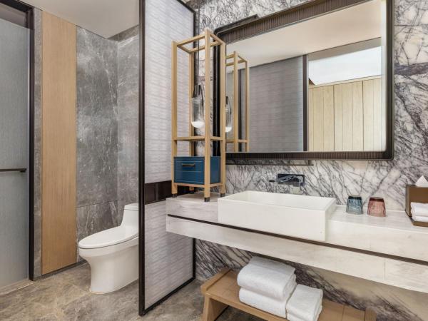 Qingdao Marriott Hotel Jiaozhou : photo 4 de la chambre chambre lit king-size supérieure