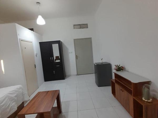 Comfortable Private Rooms in Compound Housing : photo 2 de la chambre chambre double deluxe avec balcon