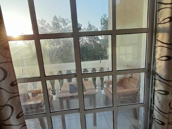 Comfortable Private Rooms in Compound Housing : photo 1 de la chambre chambre double deluxe avec balcon