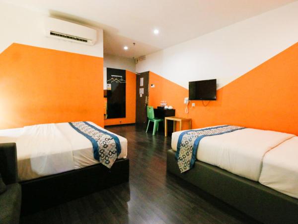 Golden Roof Hotel Ampang Ipoh : photo 6 de la chambre chambre avec 2 grands lits queen-size 