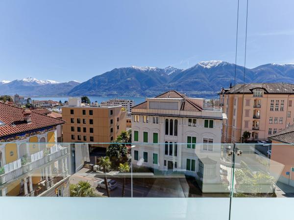 Hotel Garni Muralto : photo 3 de la chambre chambre double confort avec balcon - vue sur lac