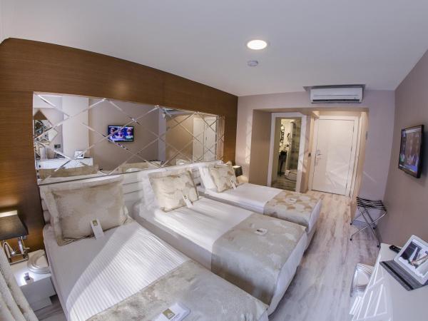 Demonti Hotel : photo 6 de la chambre chambre triple confort