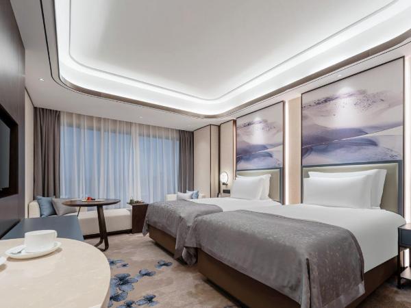 Nanyuan Hotel : photo 3 de la chambre chambre lits jumeaux deluxe