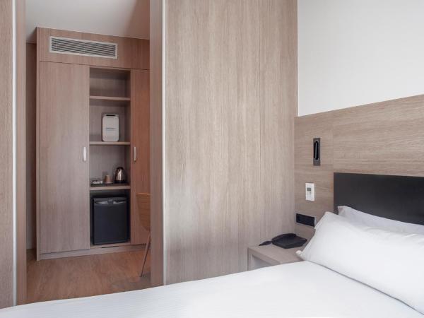 Hotel Lleó : photo 5 de la chambre chambre double ou lits jumeaux