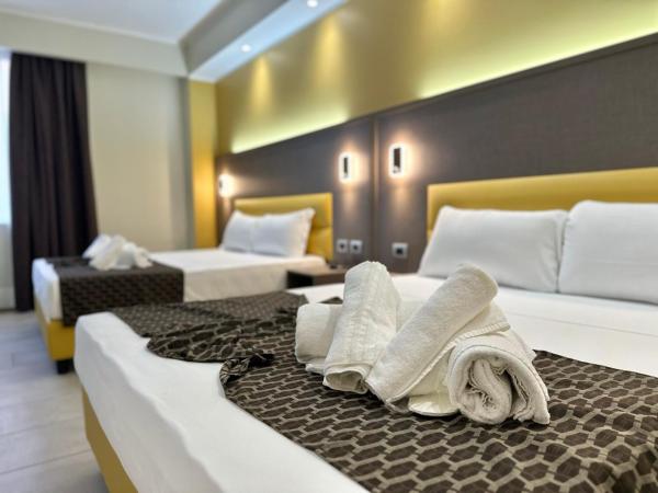 Hotel Giacosa : photo 1 de la chambre chambre quadruple standard