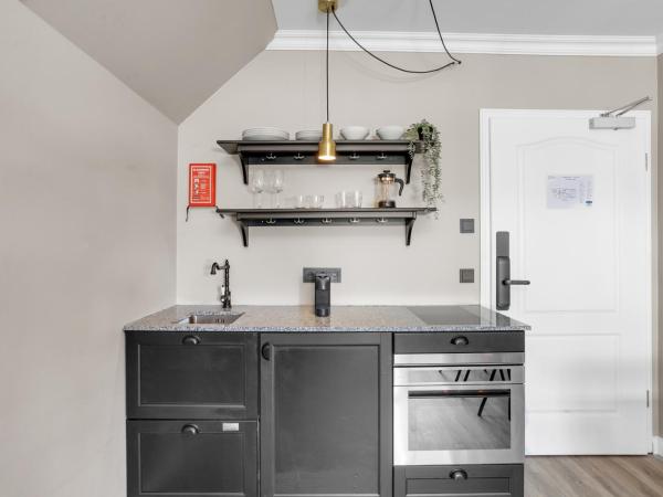 ODDSSON Downtown Hotel : photo 9 de la chambre studio triple