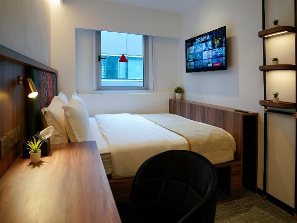 ST Signature Bugis Middle,DAYUSE,9 hours 9AM-6PM : photo 9 de la chambre deluxe room, window, dayuse, 9hrs:9am-6pm