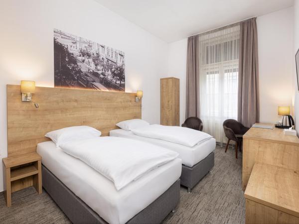 City Hotel Ring : photo 1 de la chambre chambre double ou lits jumeaux
