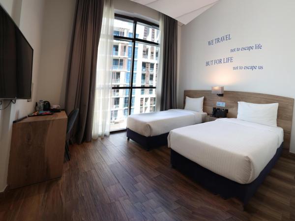 Kingsgate Al Jaddaf Hotel by Millennium : photo 1 de la chambre chambre lits jumeaux standard