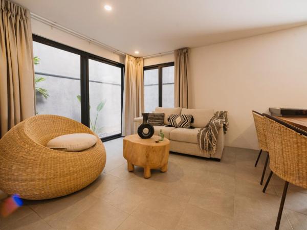 Punta Agave Suites : photo 2 de la chambre suite deluxe avec lit king-size