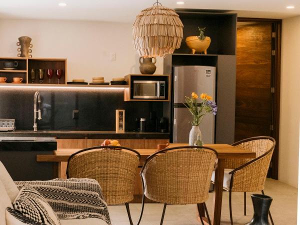 Punta Agave Suites : photo 5 de la chambre suite deluxe avec lit king-size