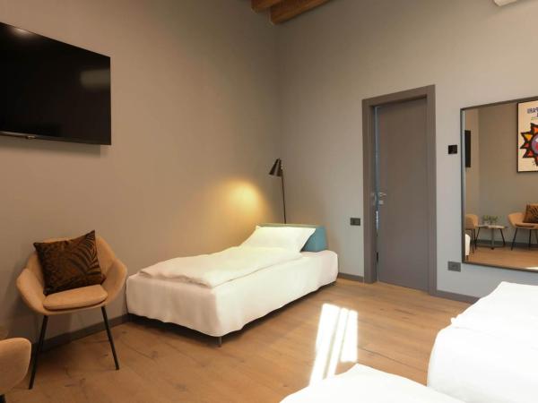 AR Suites&Art : photo 6 de la chambre chambre triple standard