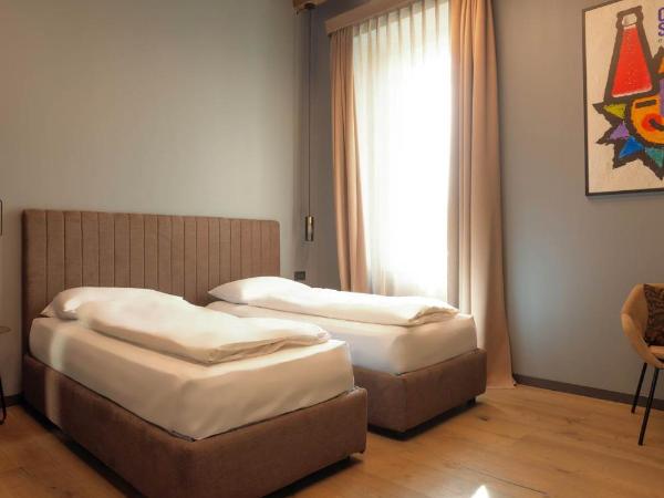 AR Suites&Art : photo 4 de la chambre chambre triple standard