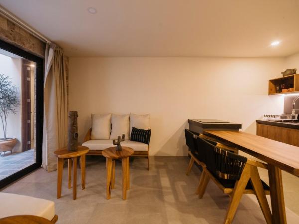 Punta Agave Suites : photo 4 de la chambre suite deluxe avec lit king-size