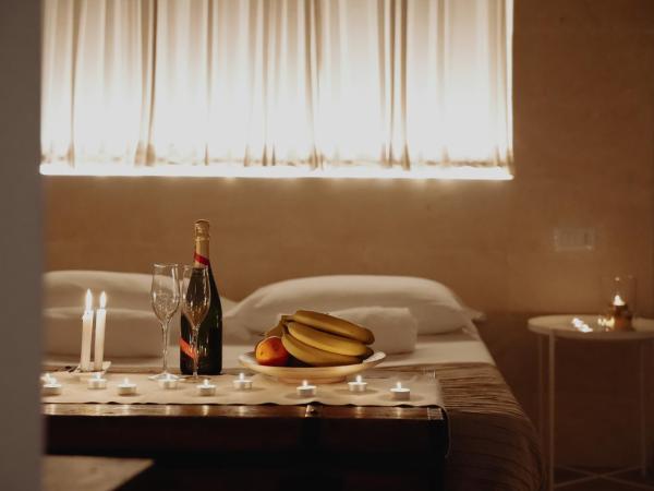 San Michele Luxury Rooms : photo 8 de la chambre suite junior