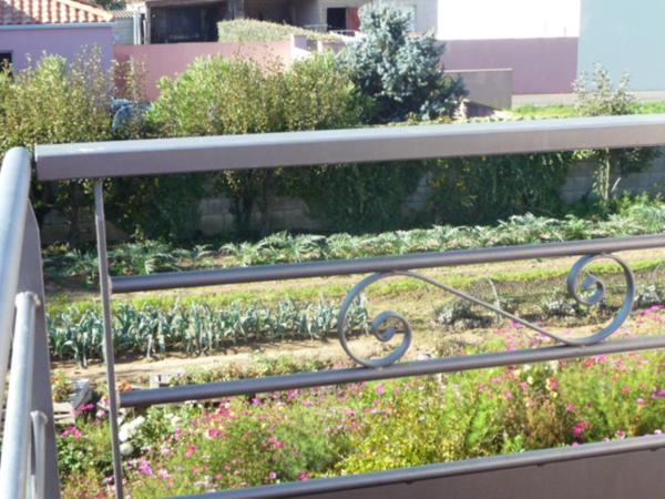 Chambre d'hôte Fleur de Potager : photo 10 de la chambre chambre triple avec terrasse