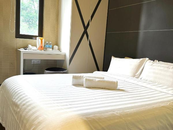 Chariton Hotel Nusa Bestari : photo 1 de la chambre chambre lit queen-size standard avec fenêtre