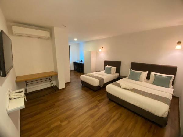 HOTEL LONGHOUSE : photo 3 de la chambre chambre quadruple deluxe