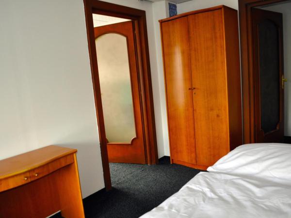 Lotos : photo 2 de la chambre chambre triple basique avec salle de bains commune